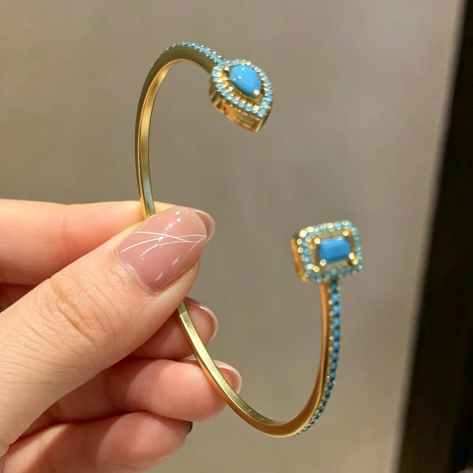 Celeste Zircon Gold Bangle